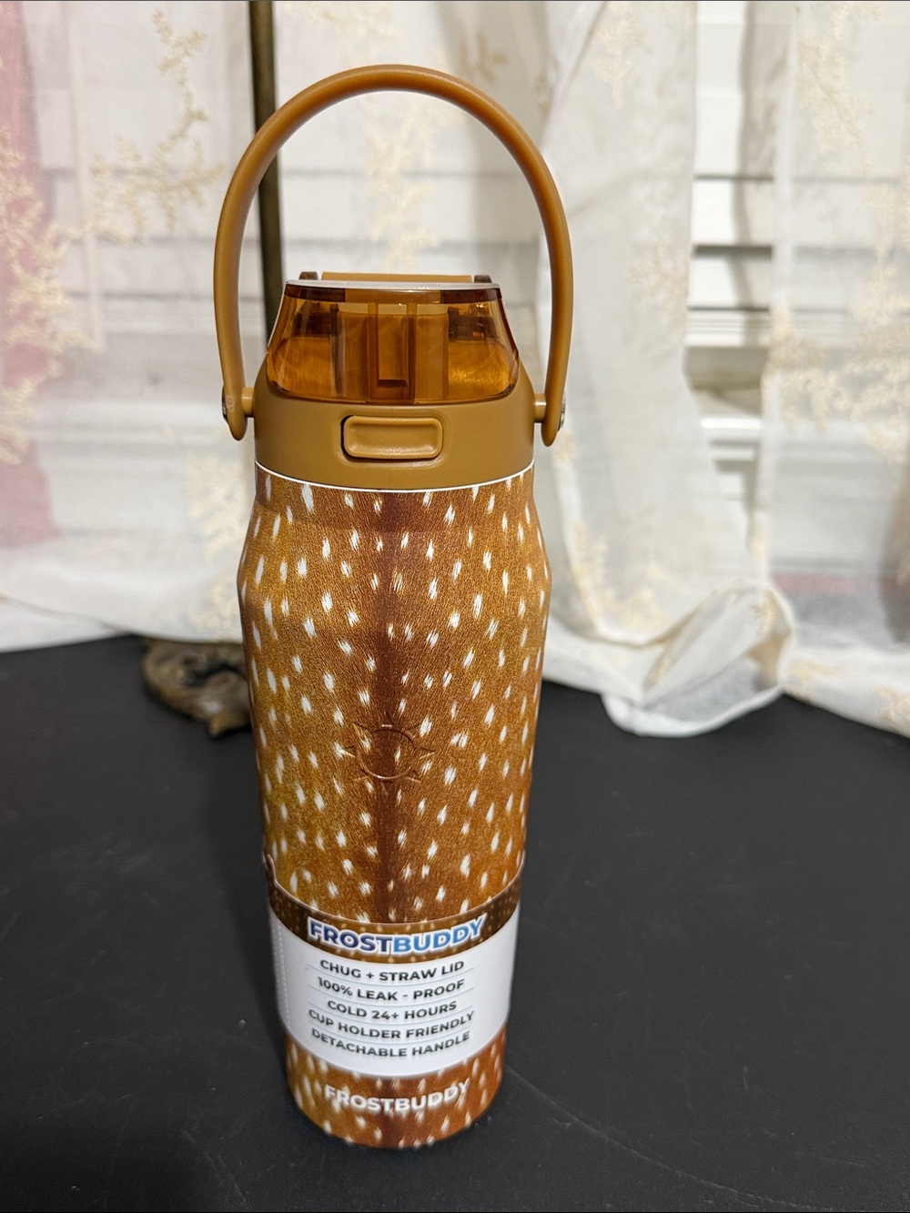 Frostbuddy 24 oz insulated water bottle in the Fawn pattern